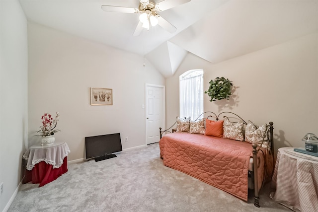 carpeted bedroom featuring ceiling fan and lofted ceiling