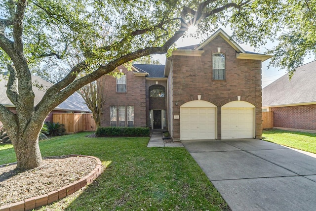 view of front property featuring a garage and a front lawn