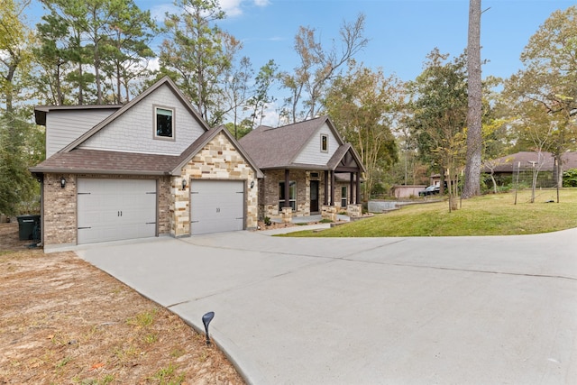 view of front of property featuring a garage and a front yard