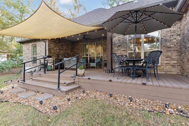 1617 Woodland Valley Dr, Huntsville, TX 77340 - deck featuring ceiling fan and an outdoor living space
