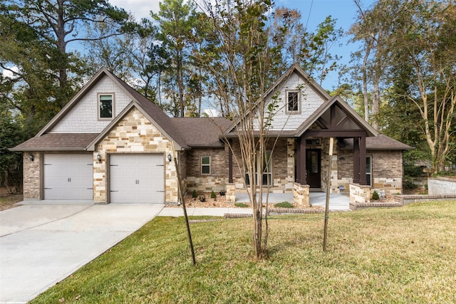 view of front of house with covered porch, a front yard, and a garage