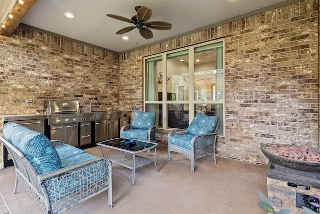 1617 Woodland Valley Dr, Huntsville, TX 77340 - view of patio featuring ceiling fan and exterior kitchen