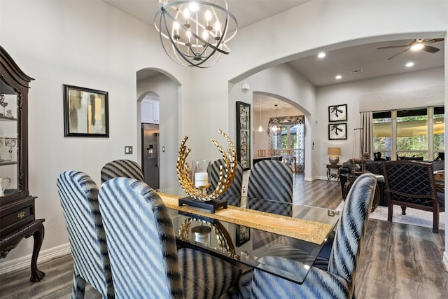 1617 Woodland Valley Dr, Huntsville, TX 77340 - dining space featuring ceiling fan with notable chandelier and dark hardwood / wood-style floors
