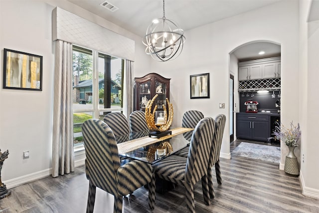 1617 Woodland Valley Dr, Huntsville, TX 77340 - dining area featuring dark hardwood / wood-style flooring and a notable chandelier