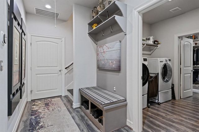 1617 Woodland Valley Dr, Huntsville, TX 77340 - laundry room featuring washer and clothes dryer and dark wood-type flooring