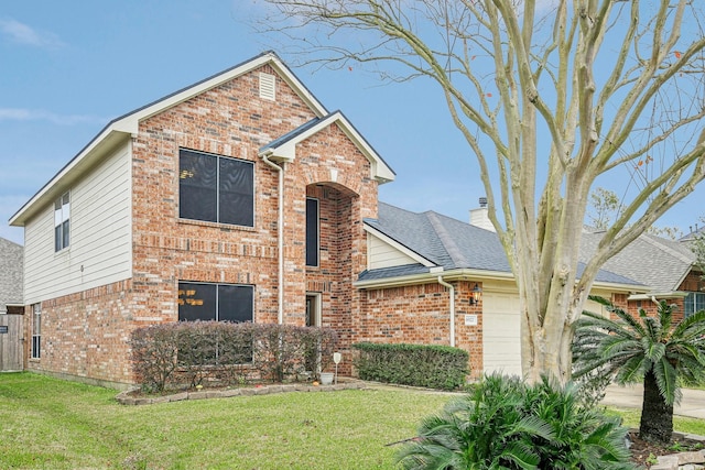 view of front facade featuring a garage and a front lawn