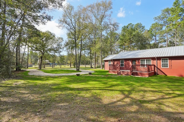 view of yard featuring a deck