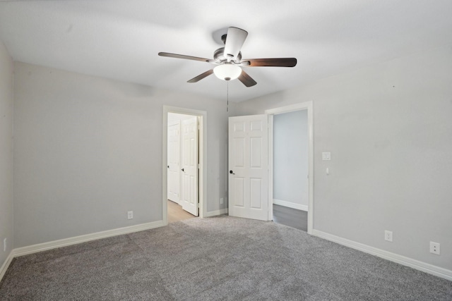 unfurnished bedroom with light colored carpet and ceiling fan