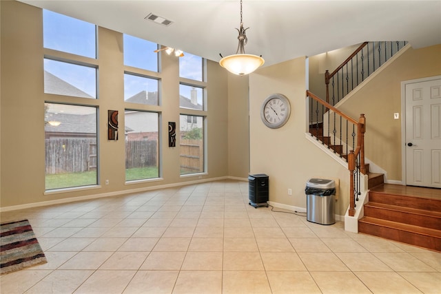 foyer entrance featuring light tile patterned floors