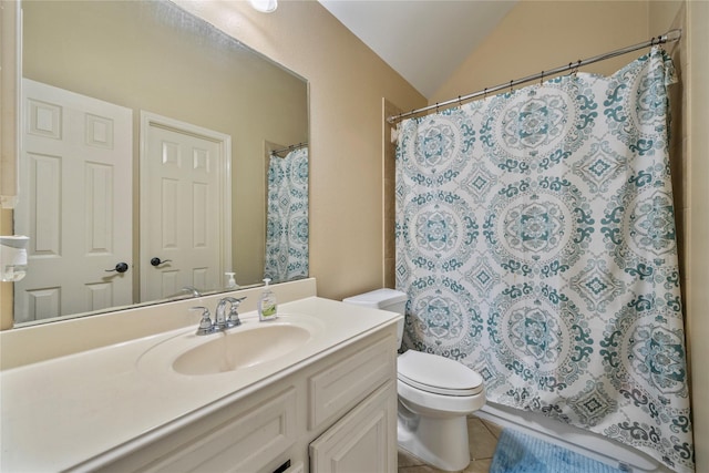 bathroom featuring vanity, lofted ceiling, tile patterned flooring, toilet, and walk in shower