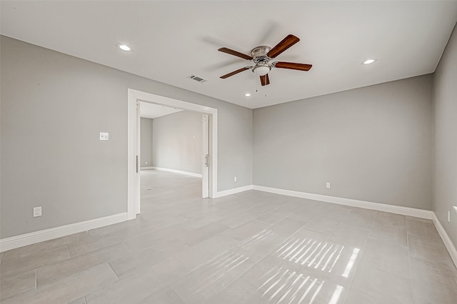 empty room featuring ceiling fan