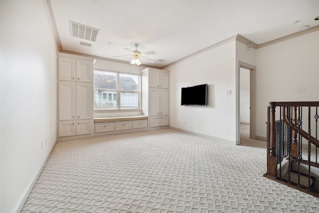 living room with light carpet, ceiling fan, and ornamental molding