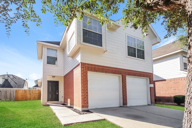 view of front of house with a front lawn and a garage