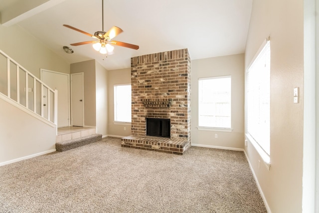 10810 Kirkbend Dr, Houston, TX 77089 - unfurnished living room featuring lofted ceiling, stairway, carpet flooring, ceiling fan, and baseboards