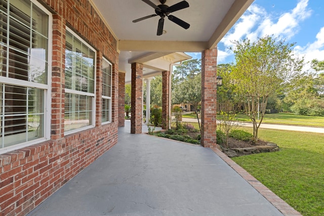 view of patio featuring ceiling fan