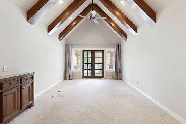 carpeted living room featuring beam ceiling, ceiling fan, french doors, and high vaulted ceiling