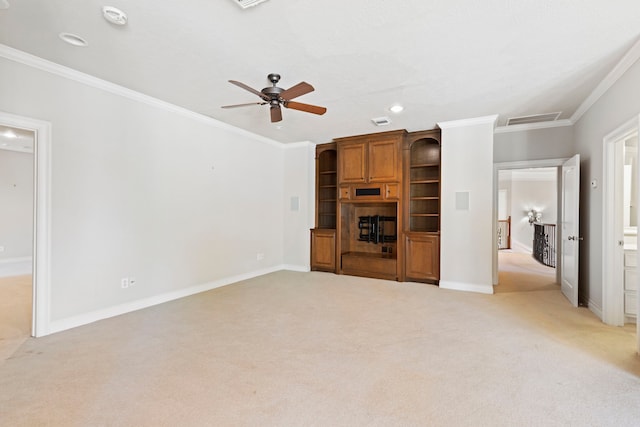 unfurnished living room with crown molding, ceiling fan, and light carpet