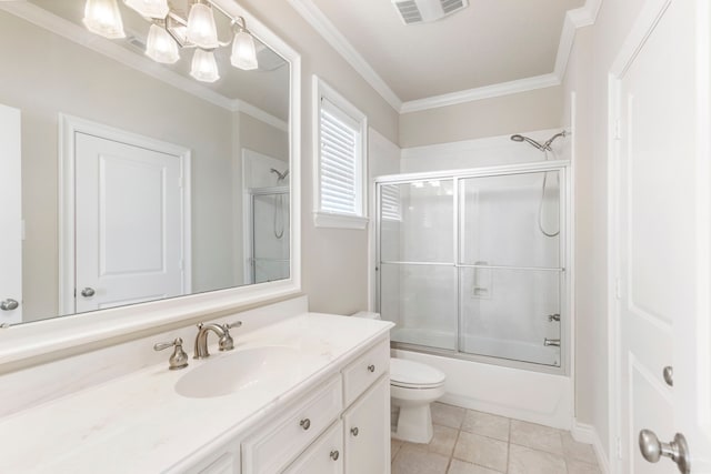 full bathroom featuring tile patterned flooring, vanity, bath / shower combo with glass door, and ornamental molding