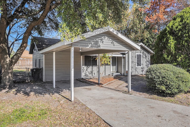 view of front of house with a carport