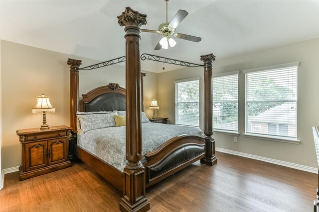 bedroom with hardwood / wood-style floors and ceiling fan