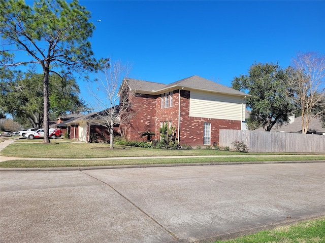 view of home's exterior with a lawn