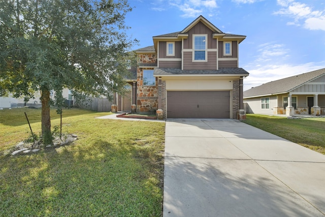 view of front of house with a garage and a front lawn