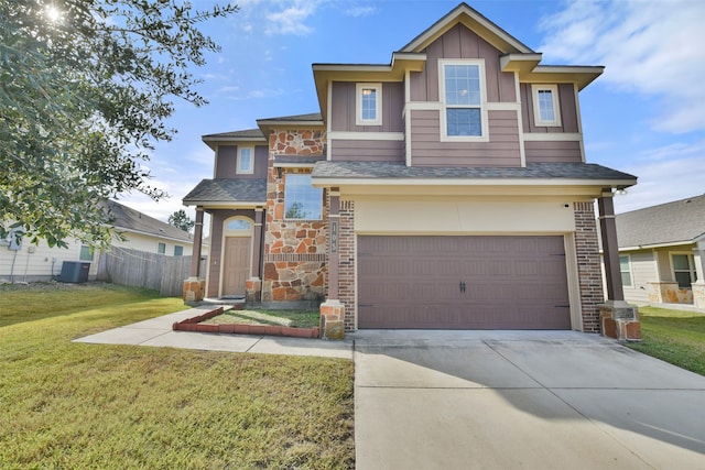 view of front of home featuring a garage, central air condition unit, and a front lawn