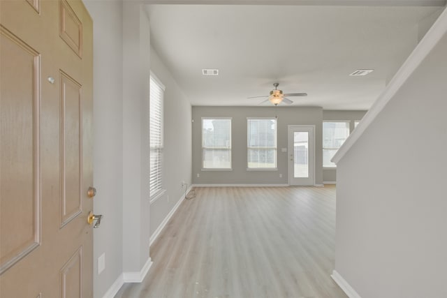 foyer featuring light hardwood / wood-style flooring and ceiling fan