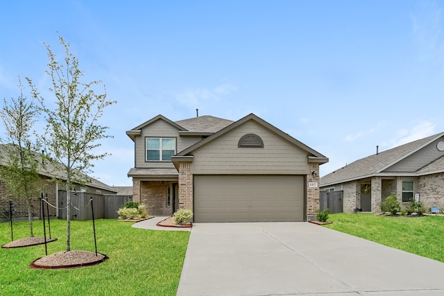 craftsman-style home with a garage and a front lawn