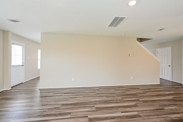 empty room featuring wood-type flooring