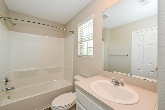 full bathroom with washtub / shower combination, vanity, and toilet