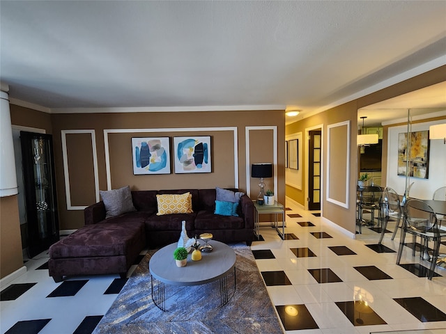 living room with a chandelier and crown molding