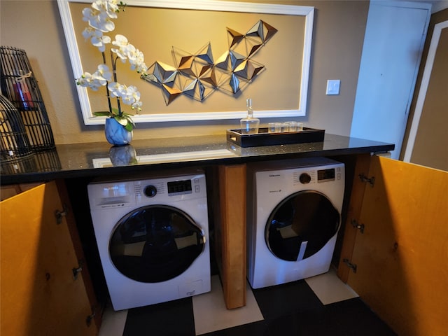 laundry room featuring washer and clothes dryer