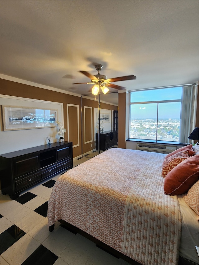 bedroom with ceiling fan and ornamental molding