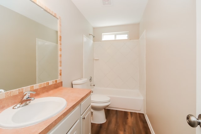 full bathroom with shower / bath combination, vanity, toilet, and wood-type flooring