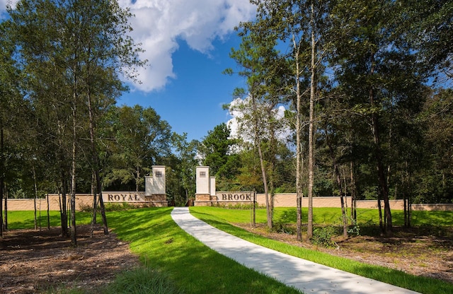 view of community featuring a lawn