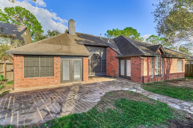 back of house with a patio area and french doors