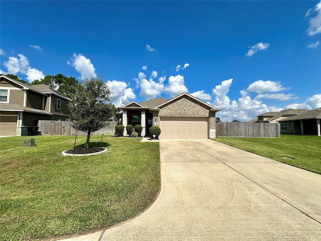 view of front of house featuring a garage and a front lawn