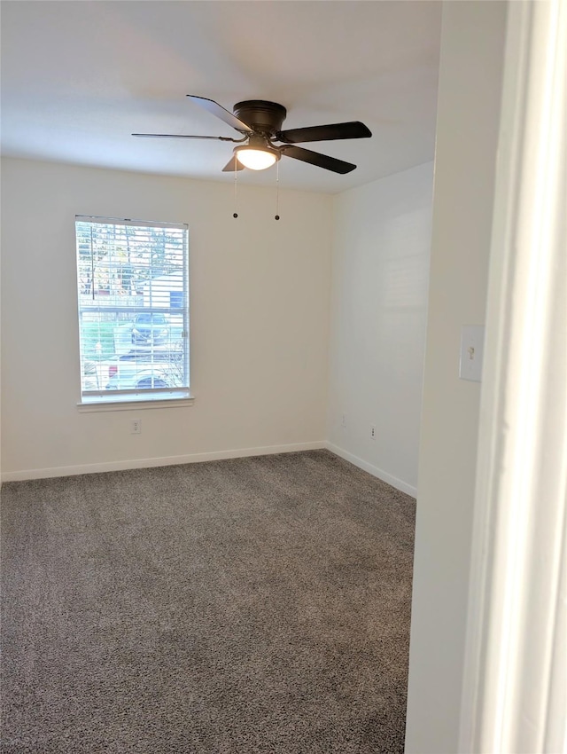 carpeted empty room with ceiling fan