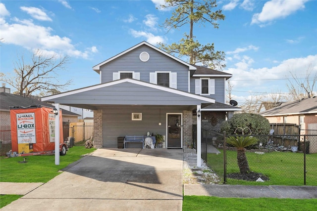 view of front of property featuring a front yard and a carport