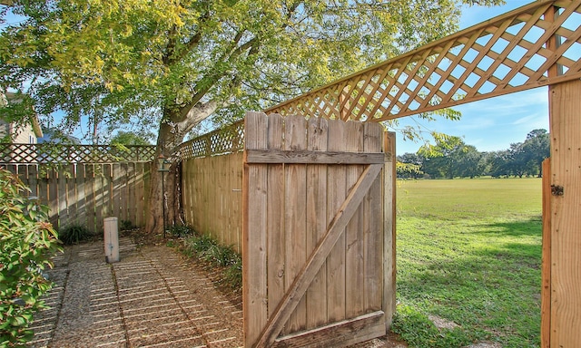 view of outdoor structure featuring a lawn