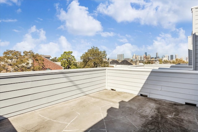 balcony featuring a city view