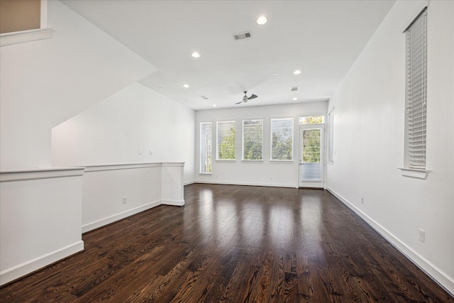 spare room featuring baseboards, visible vents, wood finished floors, and recessed lighting