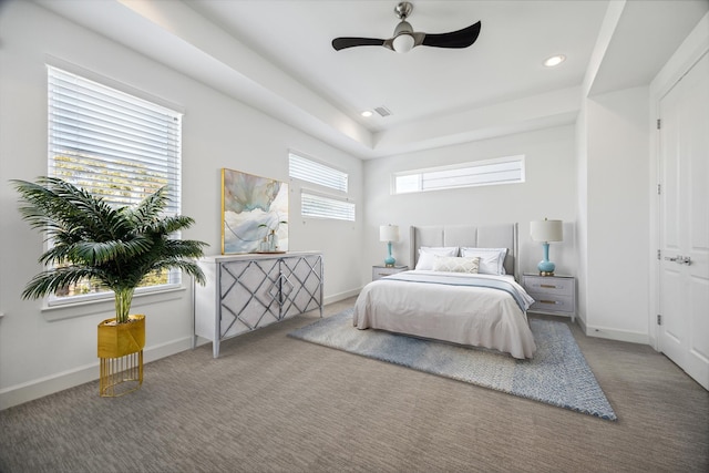 carpeted bedroom featuring ceiling fan