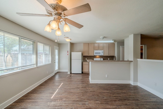 kitchen with decorative backsplash, dark hardwood / wood-style flooring, white appliances, ceiling fan, and light brown cabinets