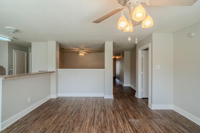 empty room featuring dark wood-type flooring