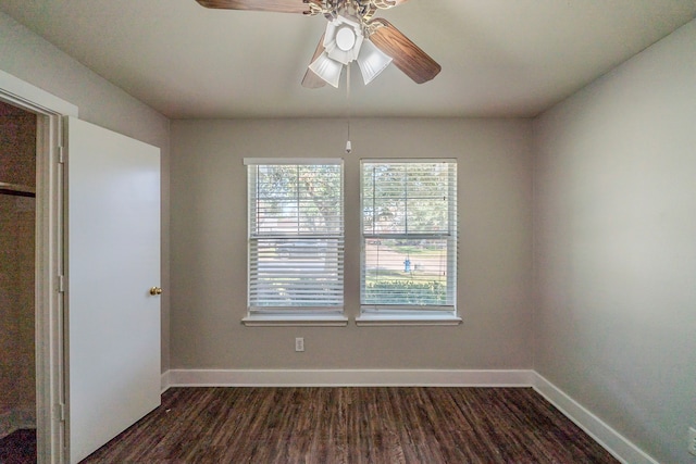 interior space featuring ceiling fan and dark hardwood / wood-style flooring