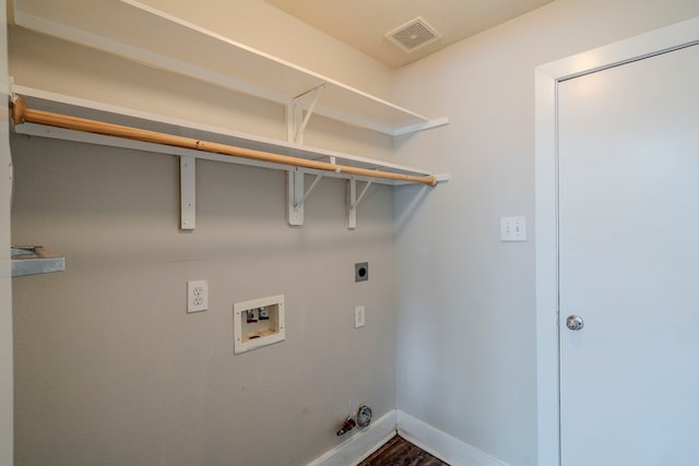 washroom featuring hookup for a washing machine, gas dryer hookup, electric dryer hookup, and wood-type flooring