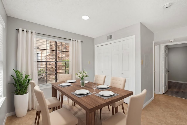 view of tiled dining area