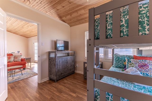 bedroom with multiple windows, wooden ceiling, and wood finished floors